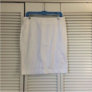 8 George White pencil skirt with zipper and clasp in the back and a slit